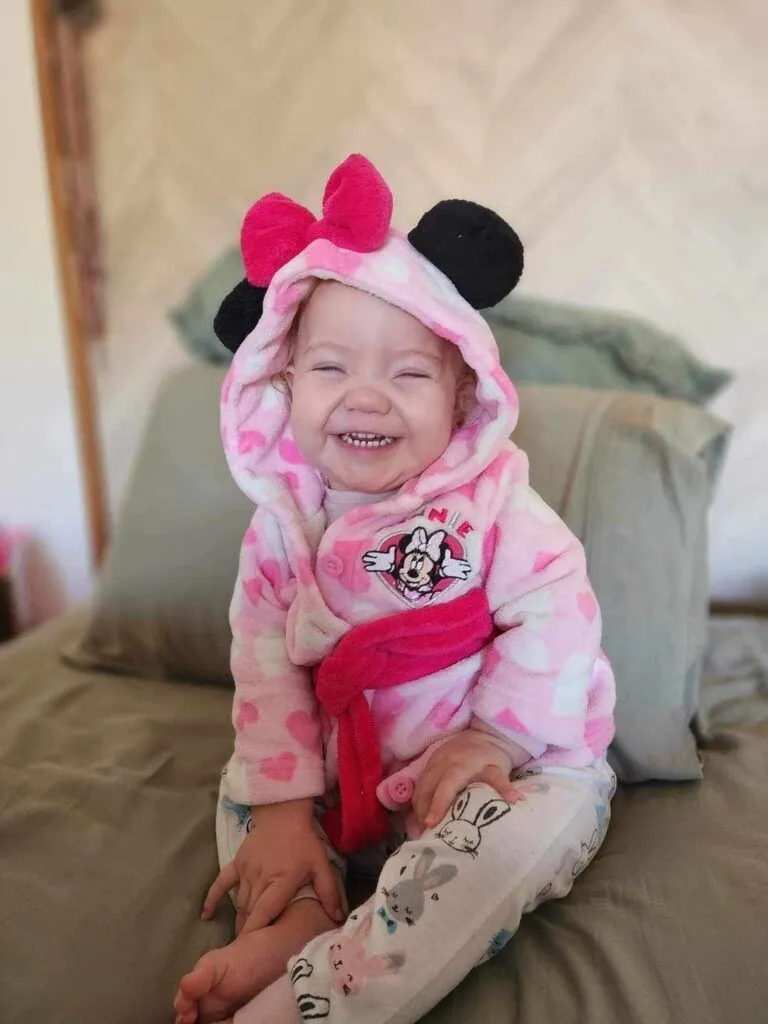 Bonnie, who lives with STXBP1, smiling.